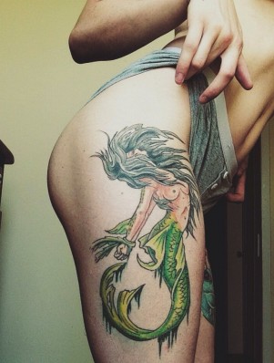 Hot girl with mermaid tattoo
