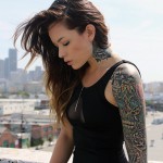 Girl with Skull Arm Tattoo